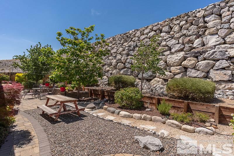 1445 Hagar Road Reno, NV 89506 - Photo 21 of 23 a view of a backyard with sitting area