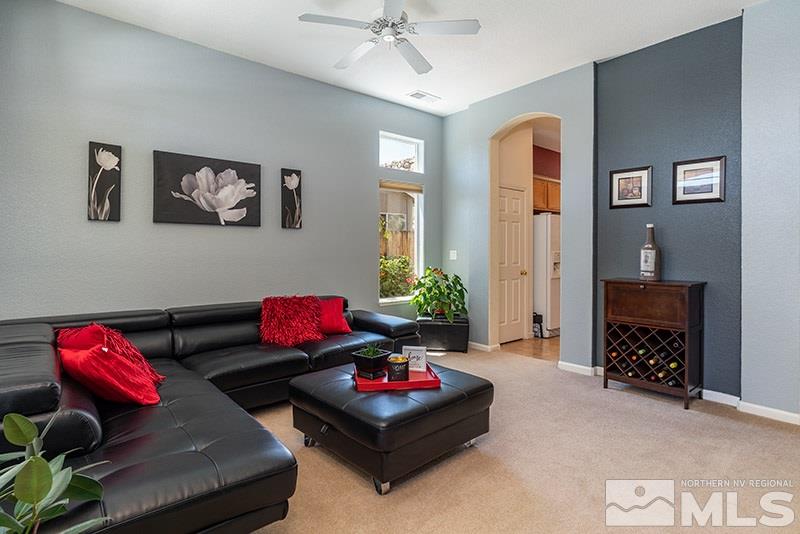 1445 Hagar Road Reno, NV 89506 - Photo 4 of 23 a living room with furniture and a couch