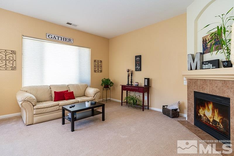 1445 Hagar Road Reno, NV 89506 - Photo 5 of 23 a living room with furniture and a fireplace