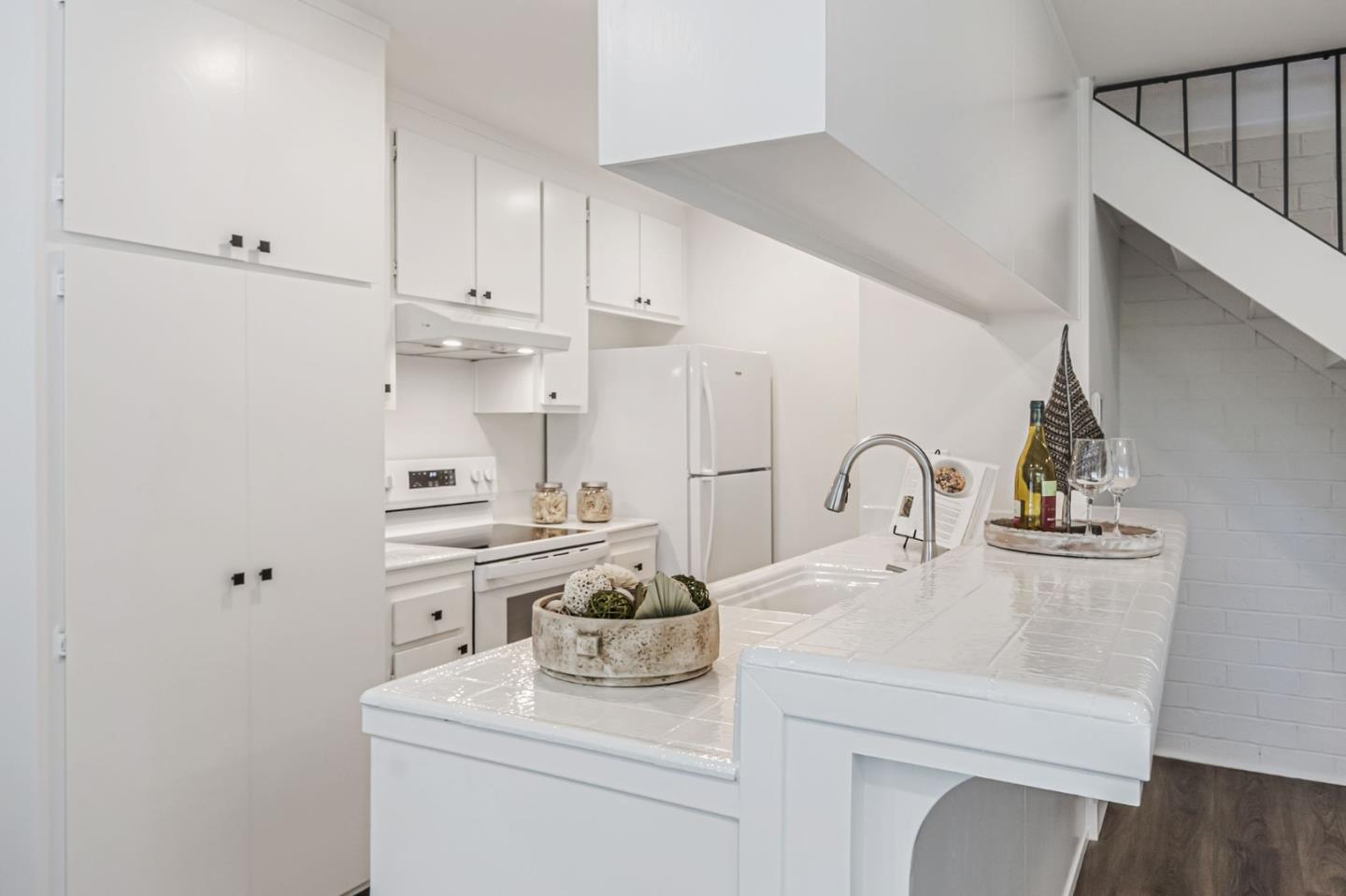 4643 Capay Drive, Unit 3 San Jose, CA 95118 - Photo 13 of 28 a kitchen with a sink cabinets and appliances
