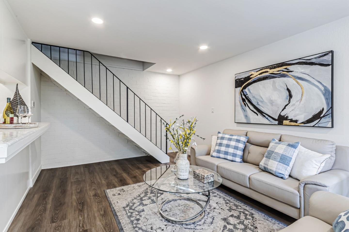 4643 Capay Drive, Unit 3 San Jose, CA 95118 - Photo 17 of 28 a living room with furniture and wooden floor