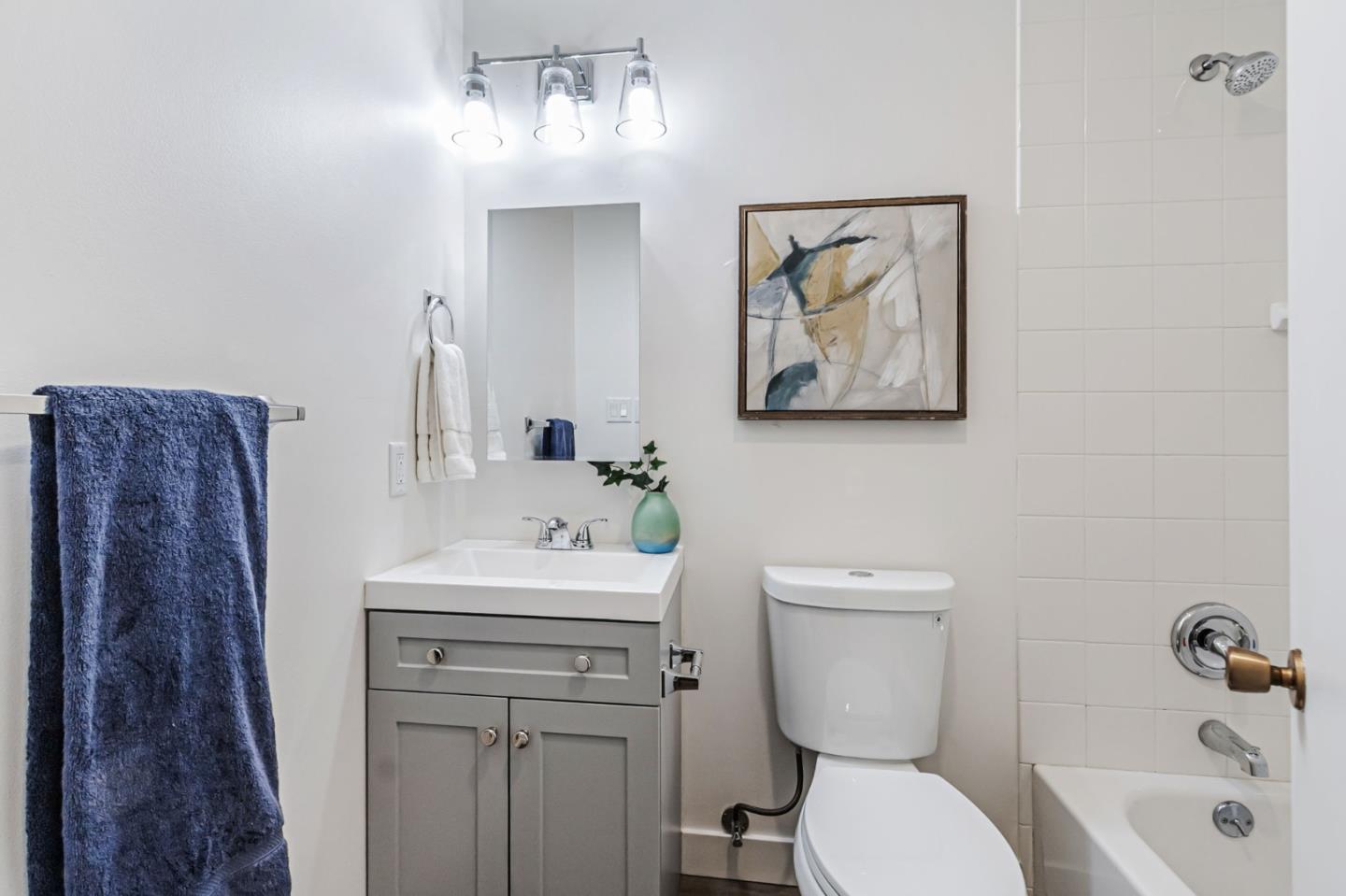 4643 Capay Drive, Unit 3 San Jose, CA 95118 - Photo 23 of 28 a bathroom with a toilet sink and mirror