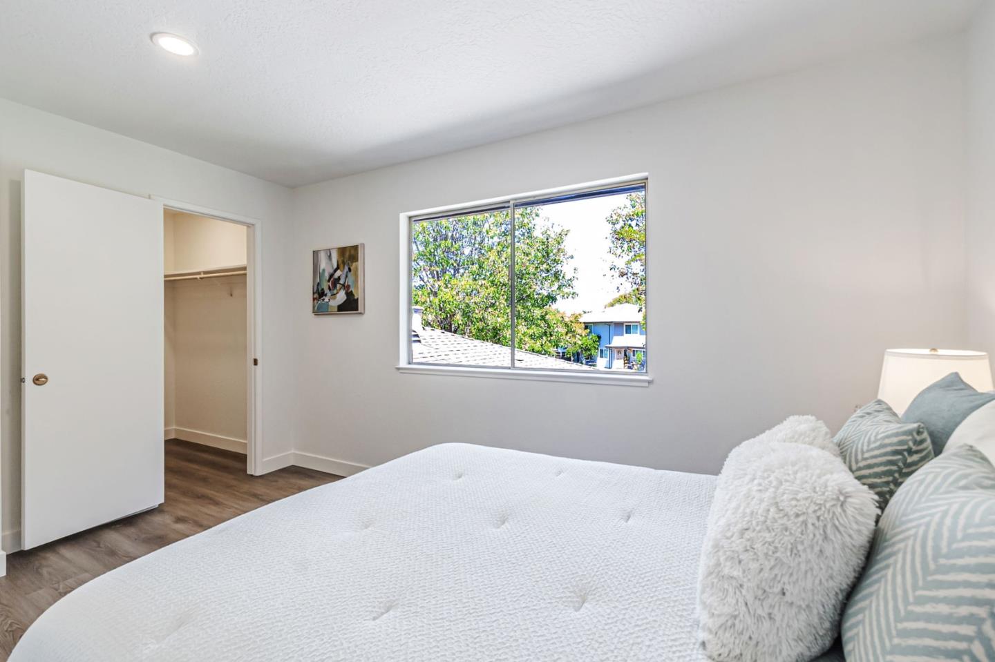 4643 Capay Drive, Unit 3 San Jose, CA 95118 - Photo 25 of 28 a bedroom with a bed and a window
