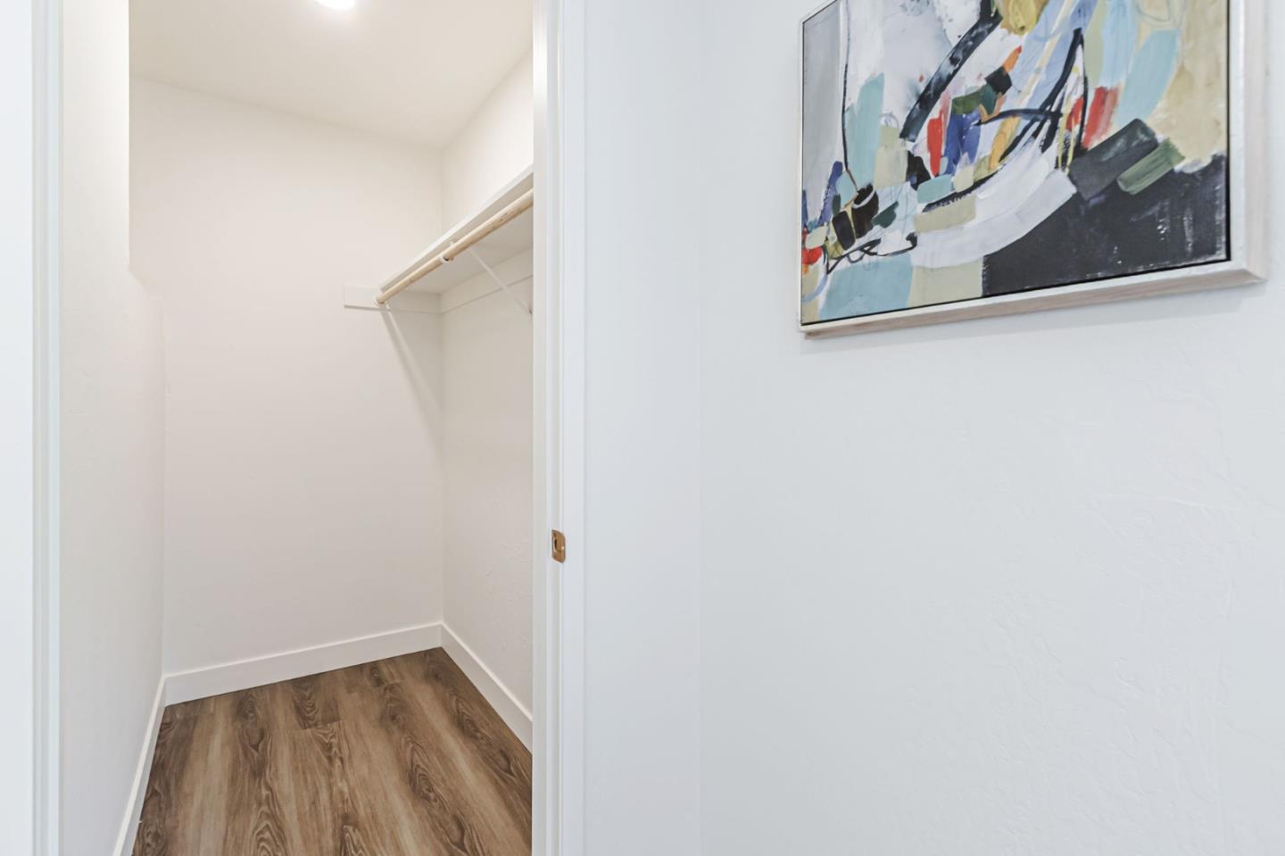 4643 Capay Drive, Unit 3 San Jose, CA 95118 - Photo 27 of 28 a view of a bathroom with a picture on the wall
