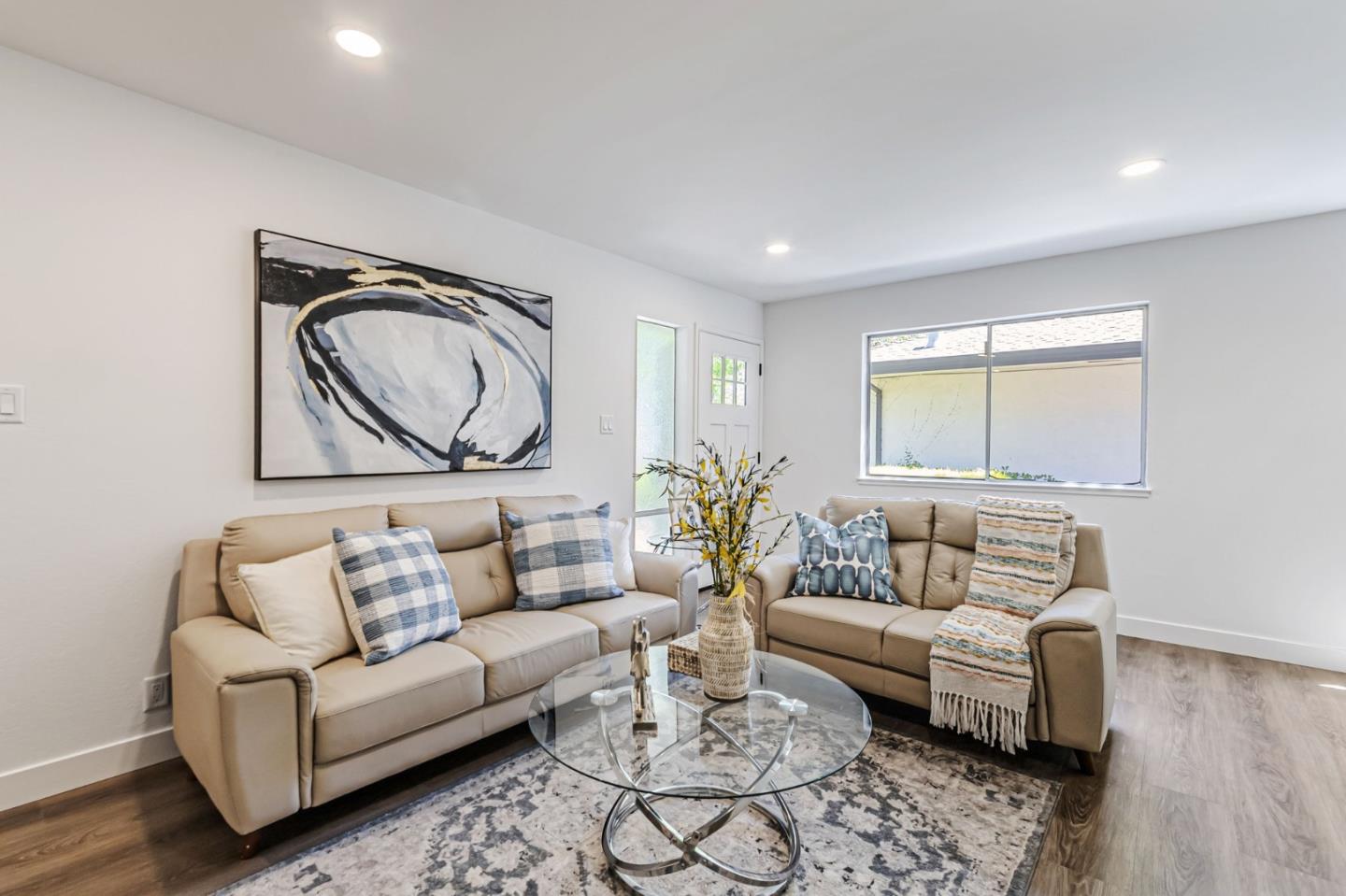 4643 Capay Drive, Unit 3 San Jose, CA 95118 - Photo 4 of 28 a living room with furniture and a large window