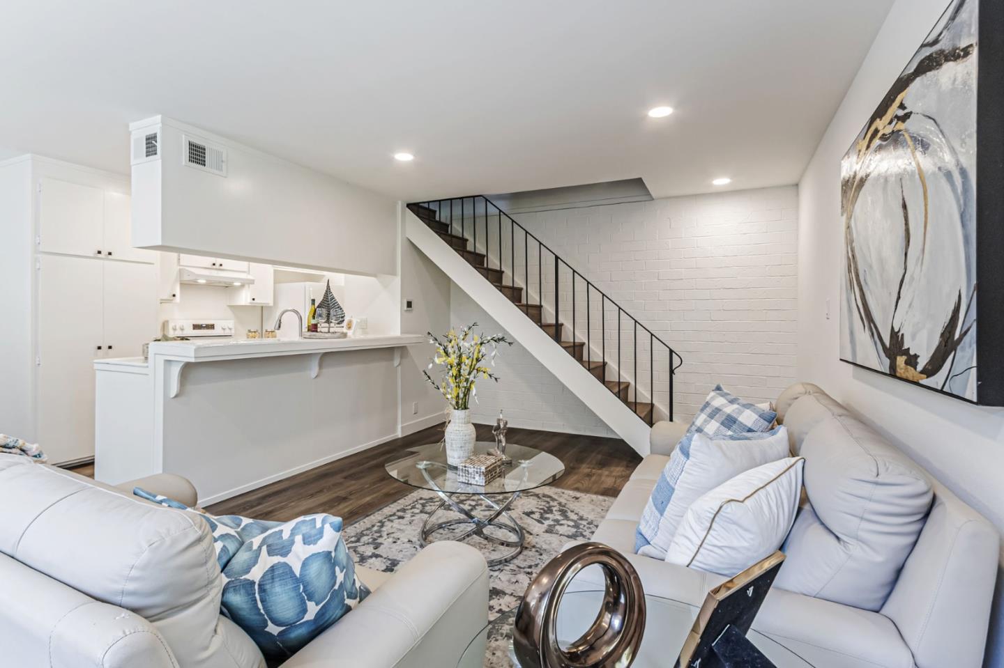 4643 Capay Drive, Unit 3 San Jose, CA 95118 - Photo 6 of 28 a view of a livingroom with furniture and stairs