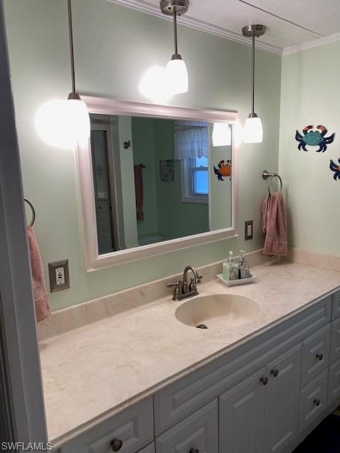 106 Audubon Road Naples, FL 34114 - Photo 19 of 27 a bathroom with a sink and a mirror