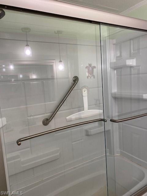 106 Audubon Road Naples, FL 34114 - Photo 21 of 27 a bathroom with a shower and mirror