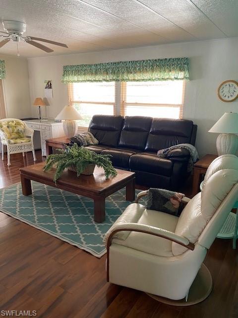 106 Audubon Road Naples, FL 34114 - Photo 8 of 27 a living room with furniture and a large window