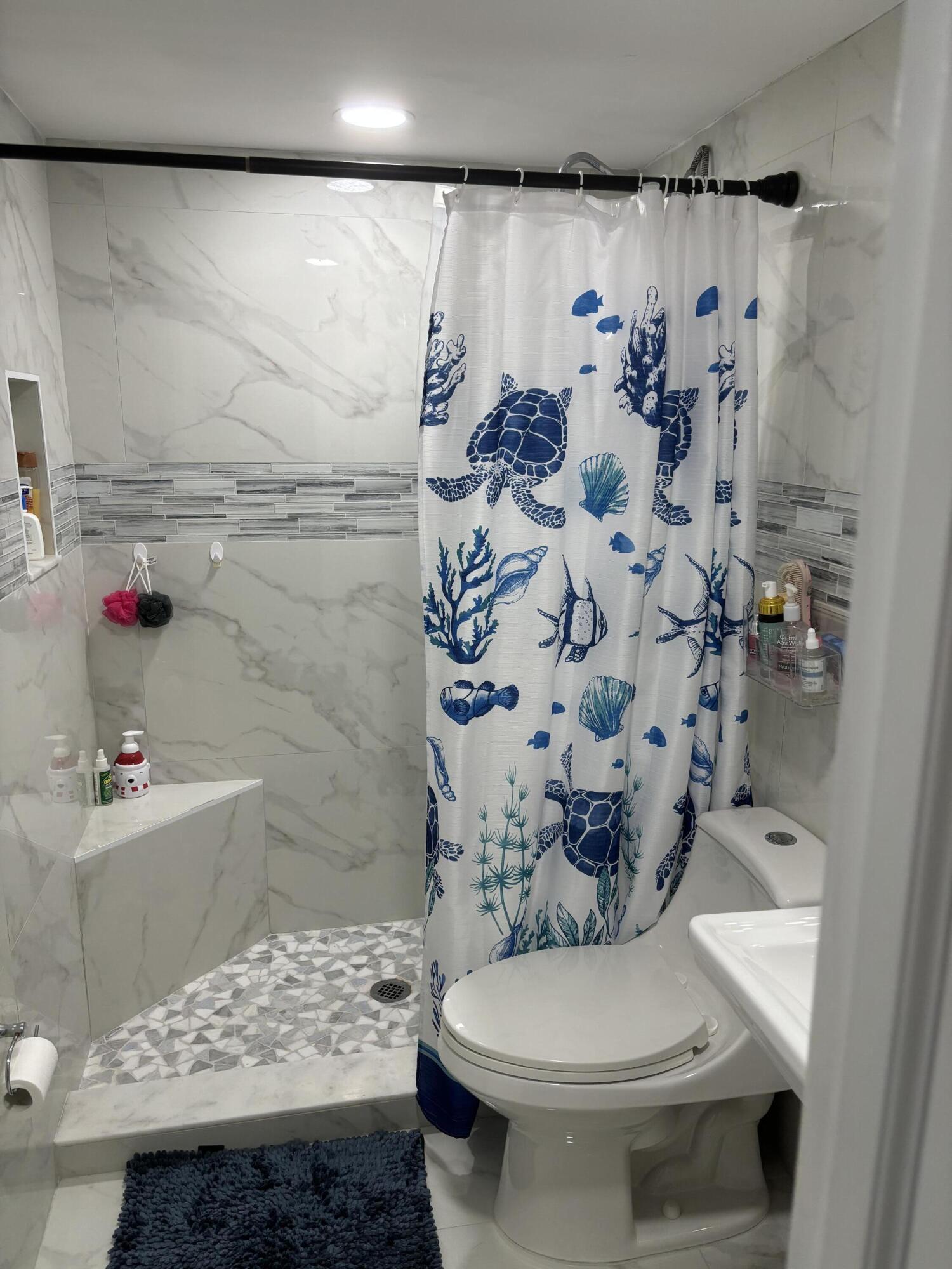 896 Southwest 9th St Circle, Unit 9 Boca Raton, FL 33486 - Photo 3 of 15 Boca Terrace 896 9 2025 bathroom