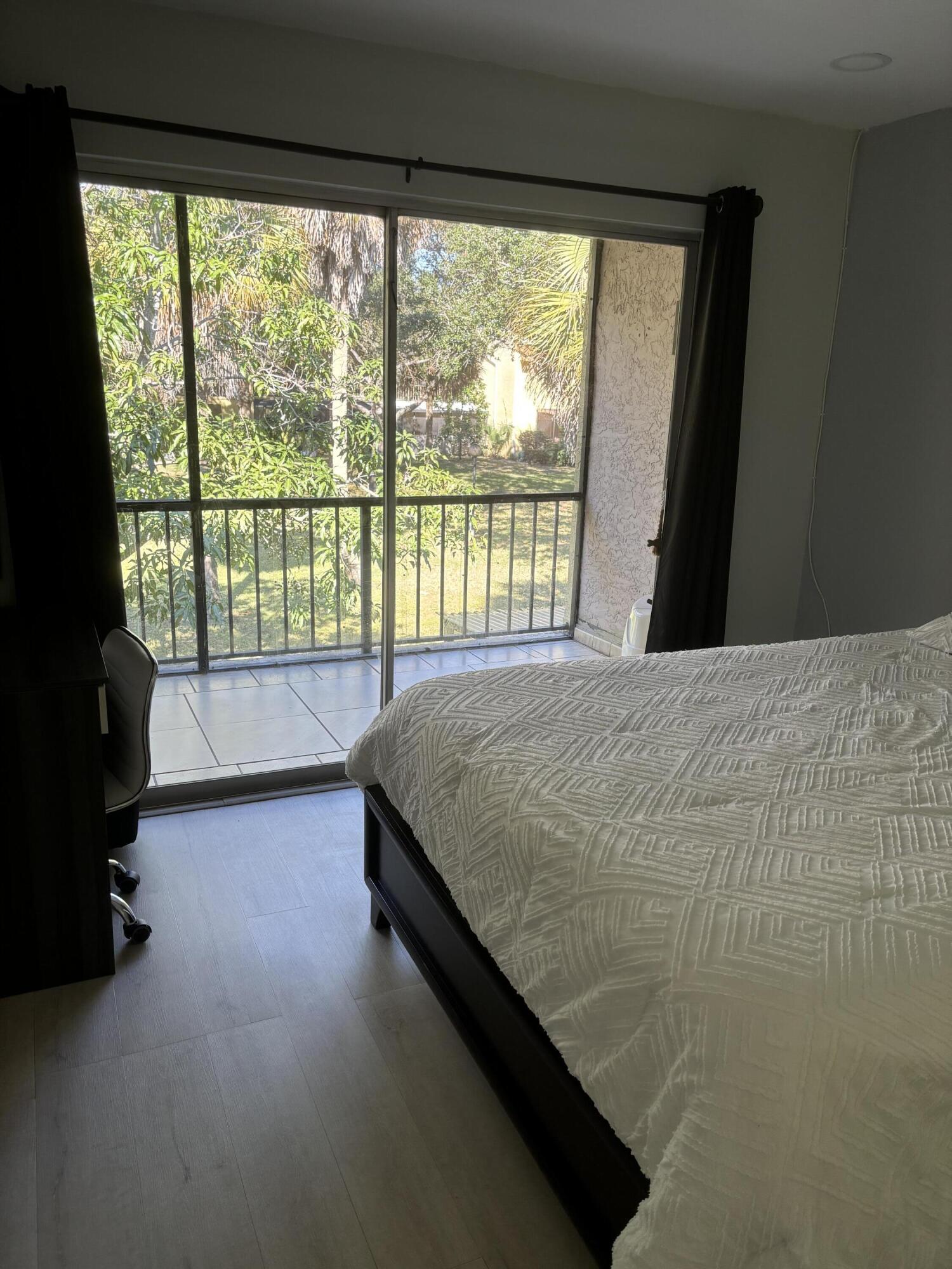 896 Southwest 9th St Circle, Unit 9 Boca Raton, FL 33486 - Photo 9 of 15 Boca Terrace 896 9 2025 upstairs bedroom