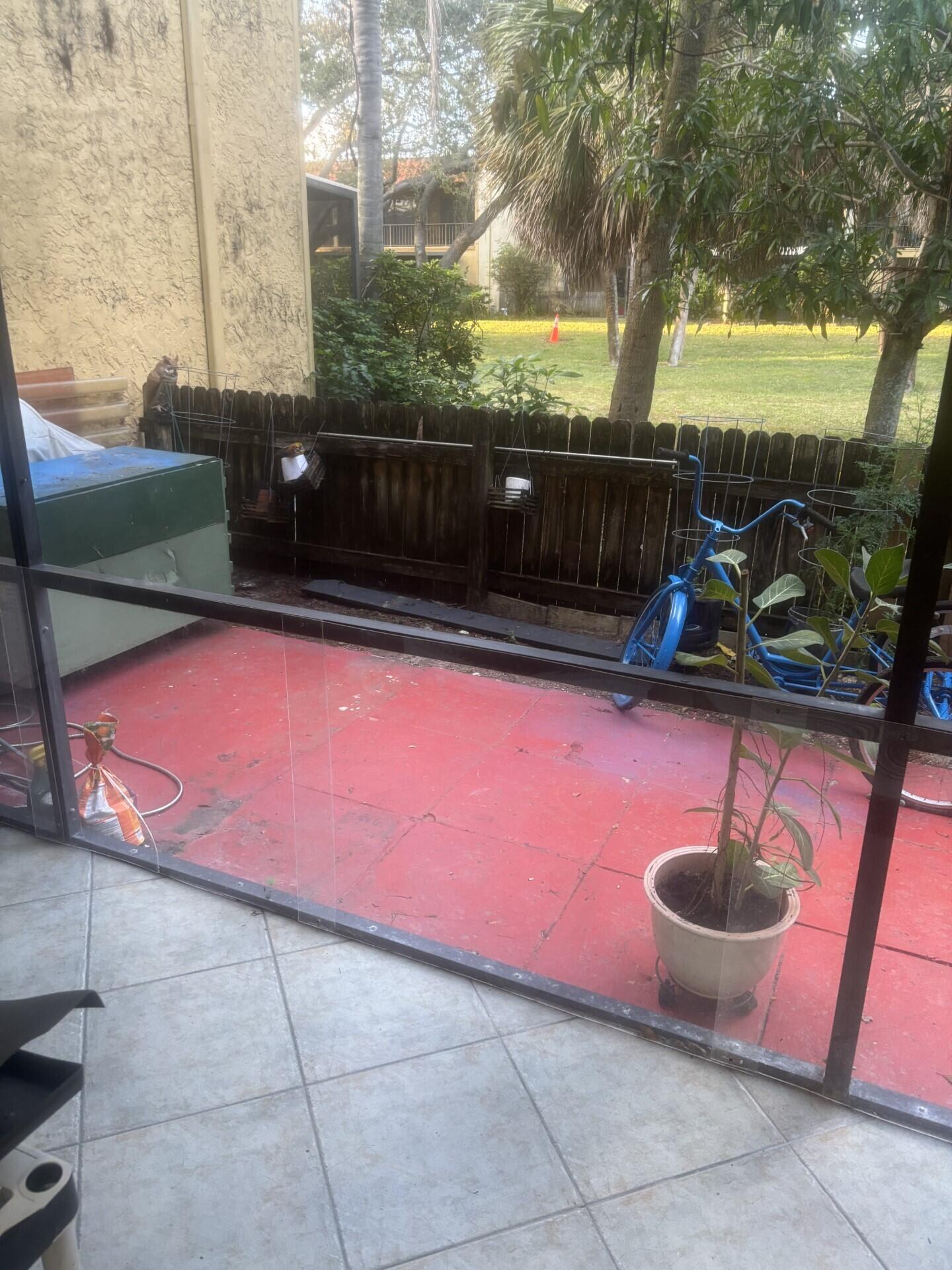 896 Southwest 9th St Circle, Unit 9 Boca Raton, FL 33486 - Photo 10 of 15 Boca Terrace back patio 2025