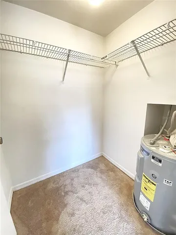 a view of a room with racks on the wall