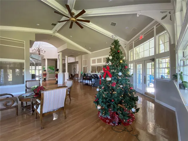 a view of a swimming pool with a patio
