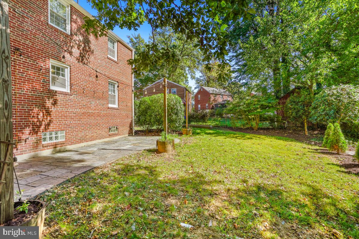 2806 Ivydale Street Silver Spring, MD 20902 - Photo 25 of 29 a view of a house with a yard and tree s