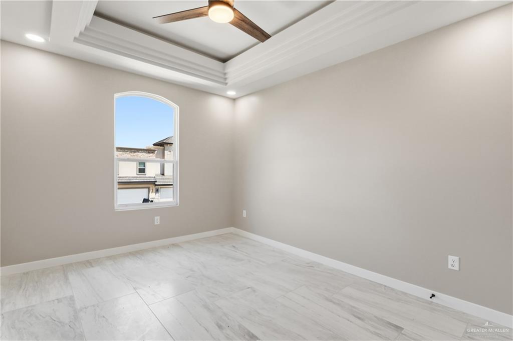 2206 Corales Street Mission, TX 78573 - Photo 15 of 19 an empty room with a empty space and window