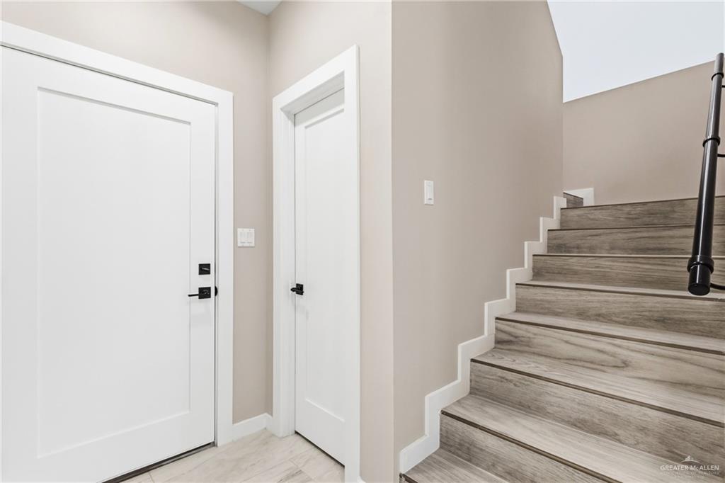 2206 Corales Street Mission, TX 78573 - Photo 7 of 19 a view of entryway with wooden floor