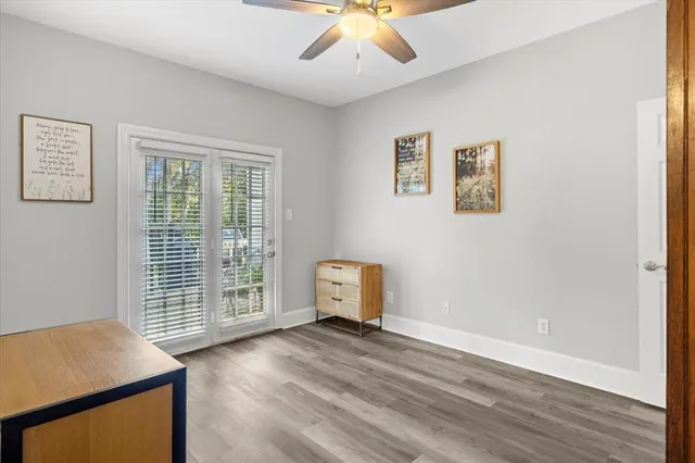 a view of a chair and tables in the garden