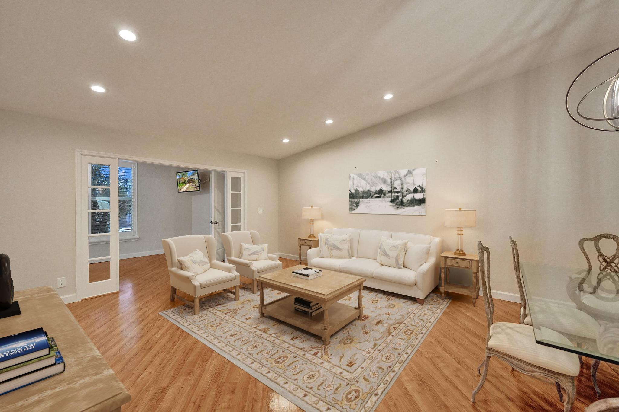 10896 Waterberry Court Boca Raton, FL 33498 - Photo 16 of 34 a living room with furniture and wooden floor