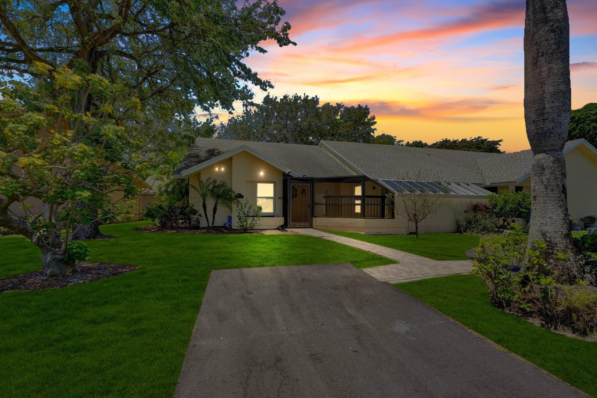 10896 Waterberry Court Boca Raton, FL 33498 - Photo 2 of 34 a aerial view of a house next to a yard