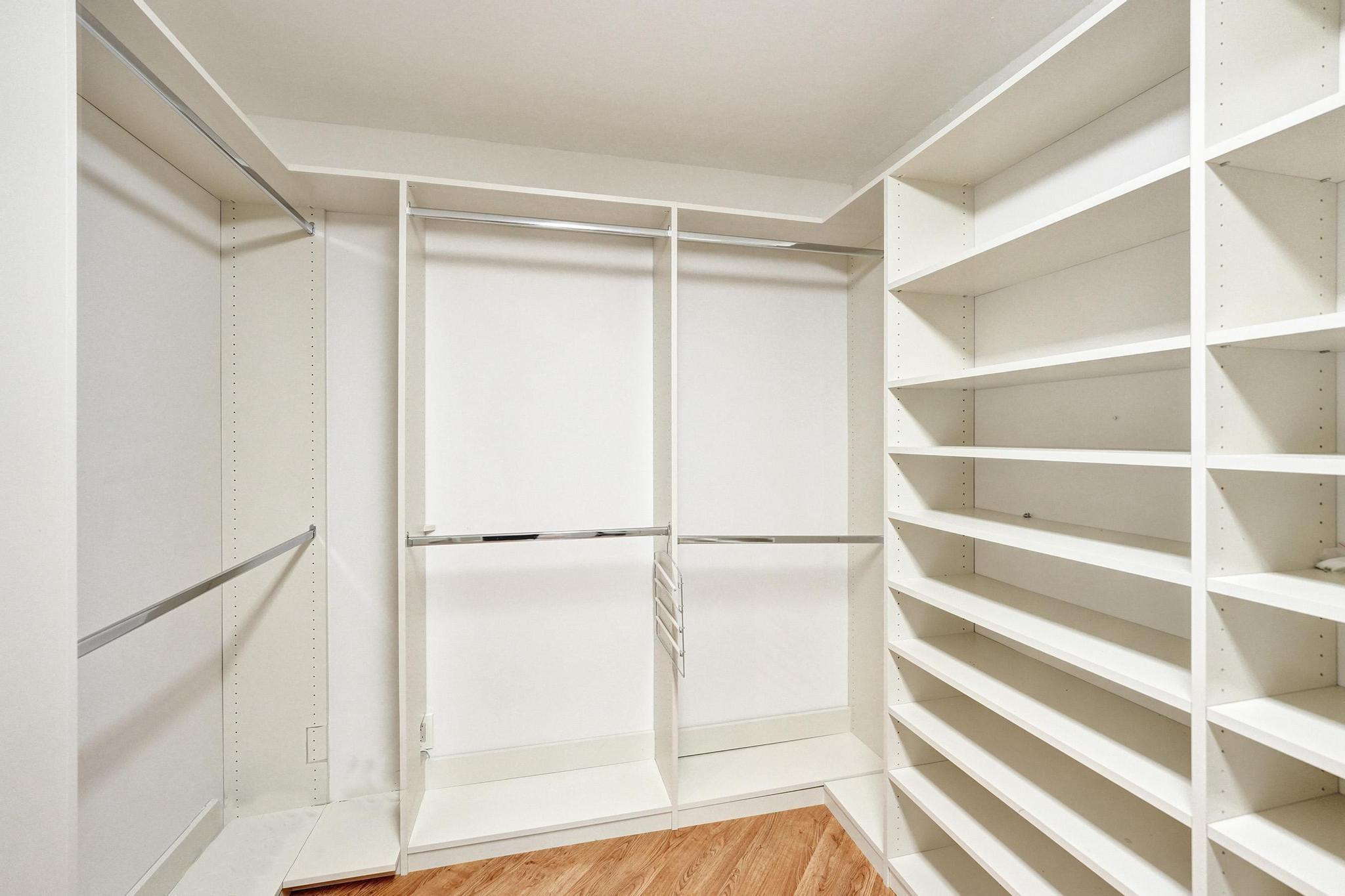 10896 Waterberry Court Boca Raton, FL 33498 - Photo 30 of 34 a view of an empty walk in closet