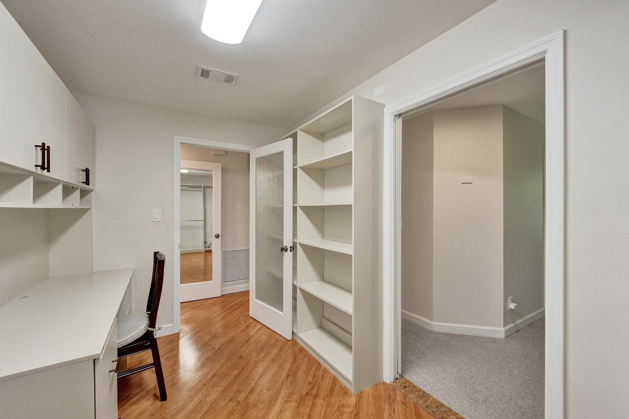 10896 Waterberry Court Boca Raton, FL 33498 - Photo 31 of 34 a view of a livingroom with furniture and wooden floor
