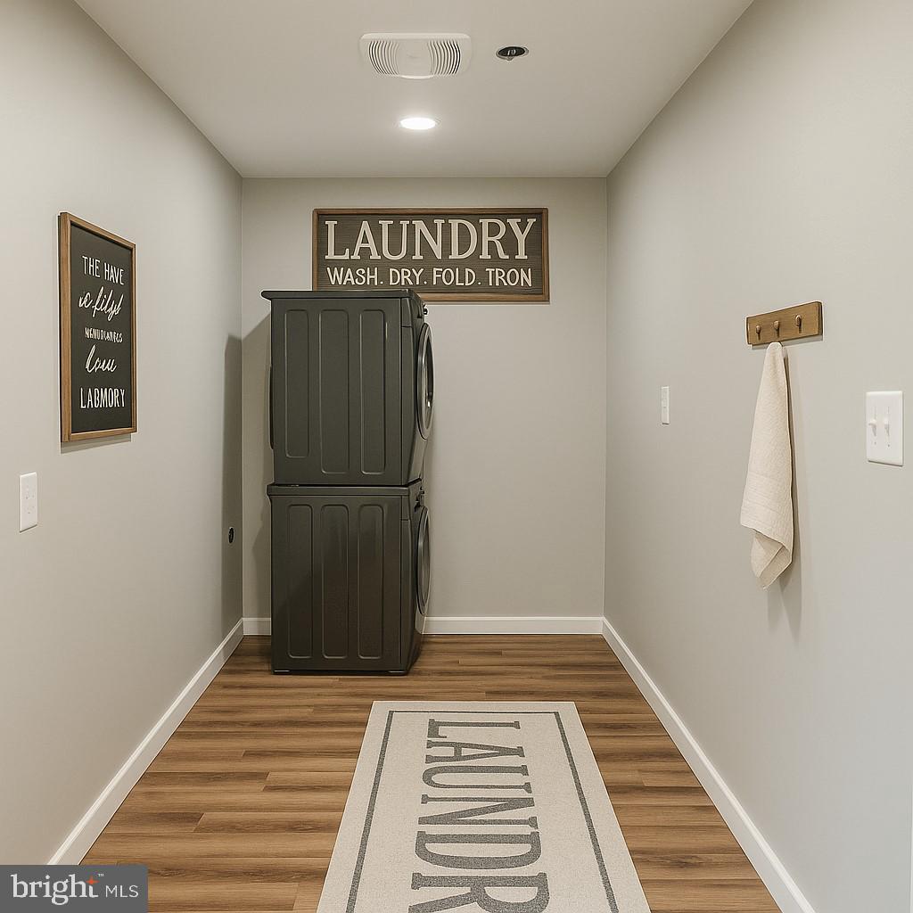 7699 Hedgesville Road Hedgesville, WV 25427 - Photo 18 of 47 a view of a hallway with wooden floor and a refrigerator