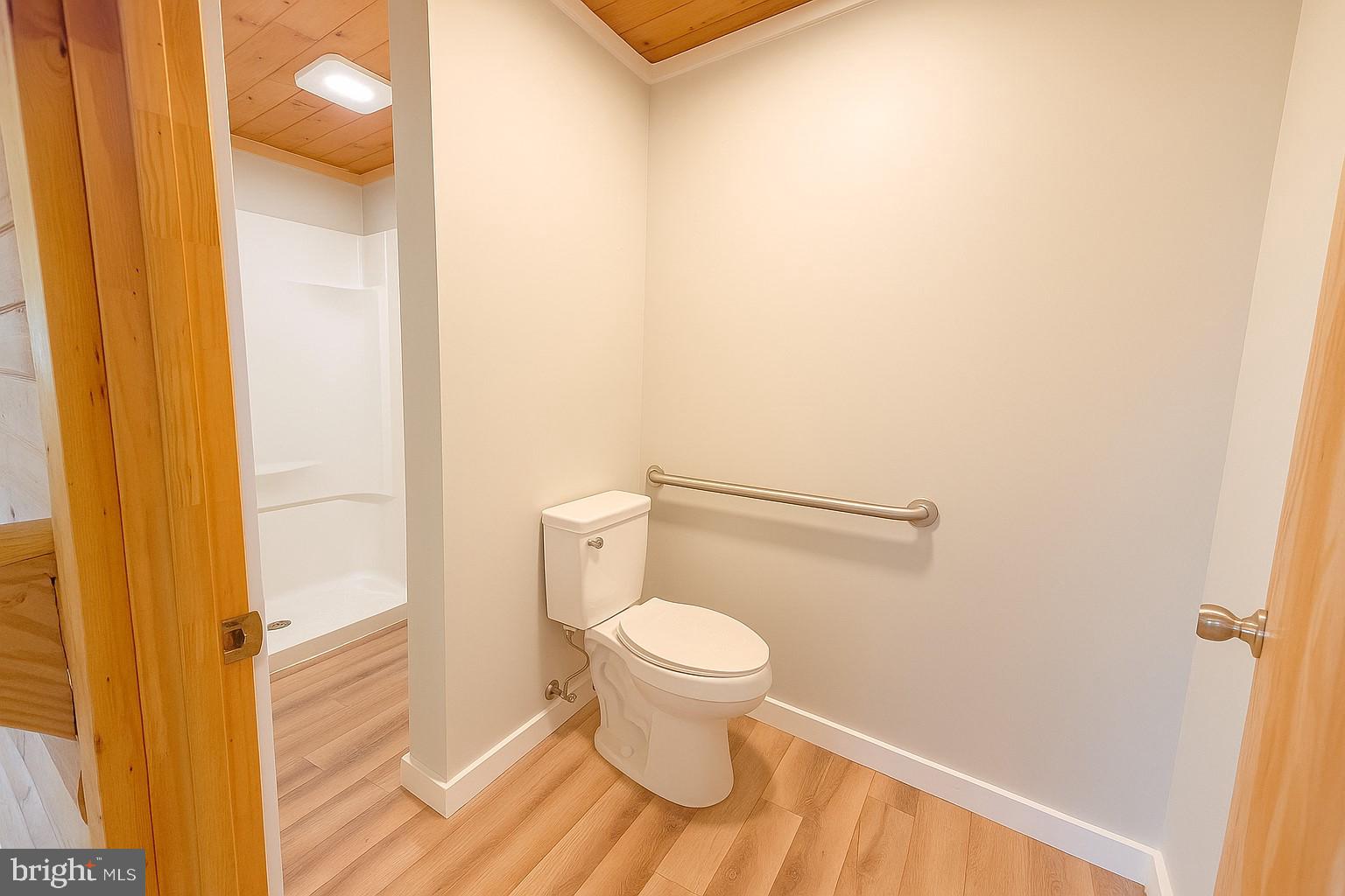 7699 Hedgesville Road Hedgesville, WV 25427 - Photo 25 of 47 a bathroom with a toilet and a sink