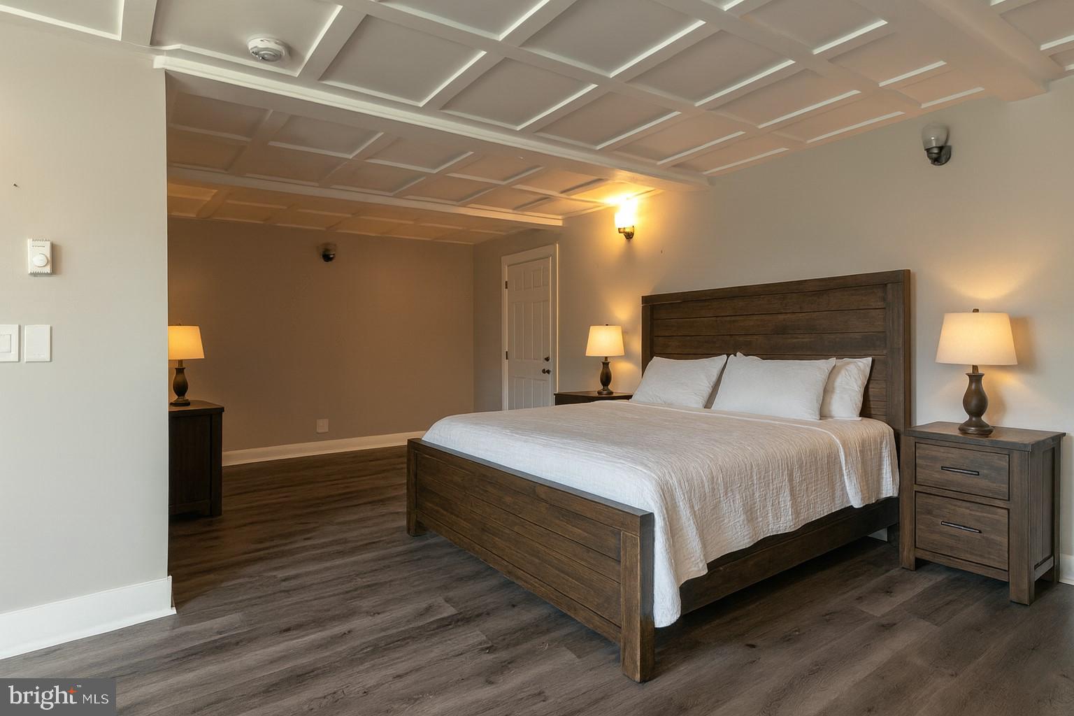 7699 Hedgesville Road Hedgesville, WV 25427 - Photo 39 of 47 a bedroom with a bed and a night stand