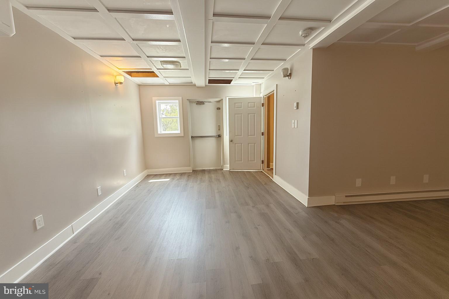 7699 Hedgesville Road Hedgesville, WV 25427 - Photo 44 of 47 a view of a room with wooden floor