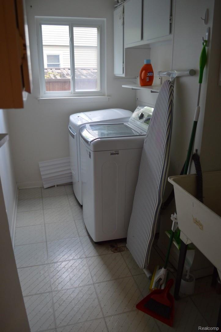 42415 Park Ridge Road Novi, MI 48375 - Photo 15 of 26 Laundry on main level just off the garage entrance