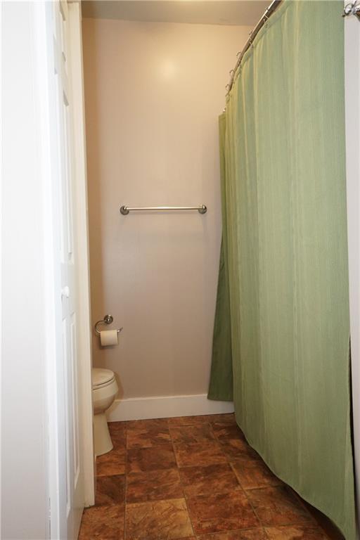124 Hazel Street Kittanning, PA 16201 - Photo 21 of 26 a bathroom with a toilet and a shower