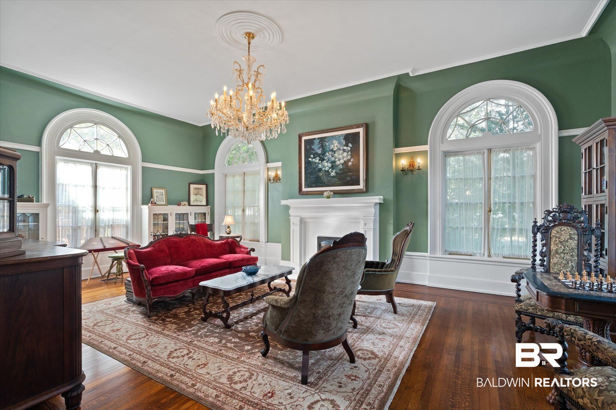 1953 Dauphin Street Mobile, AL 36606 - Photo 10 of 56 Living room with a chandelier and dark hardwood / wood-style floors