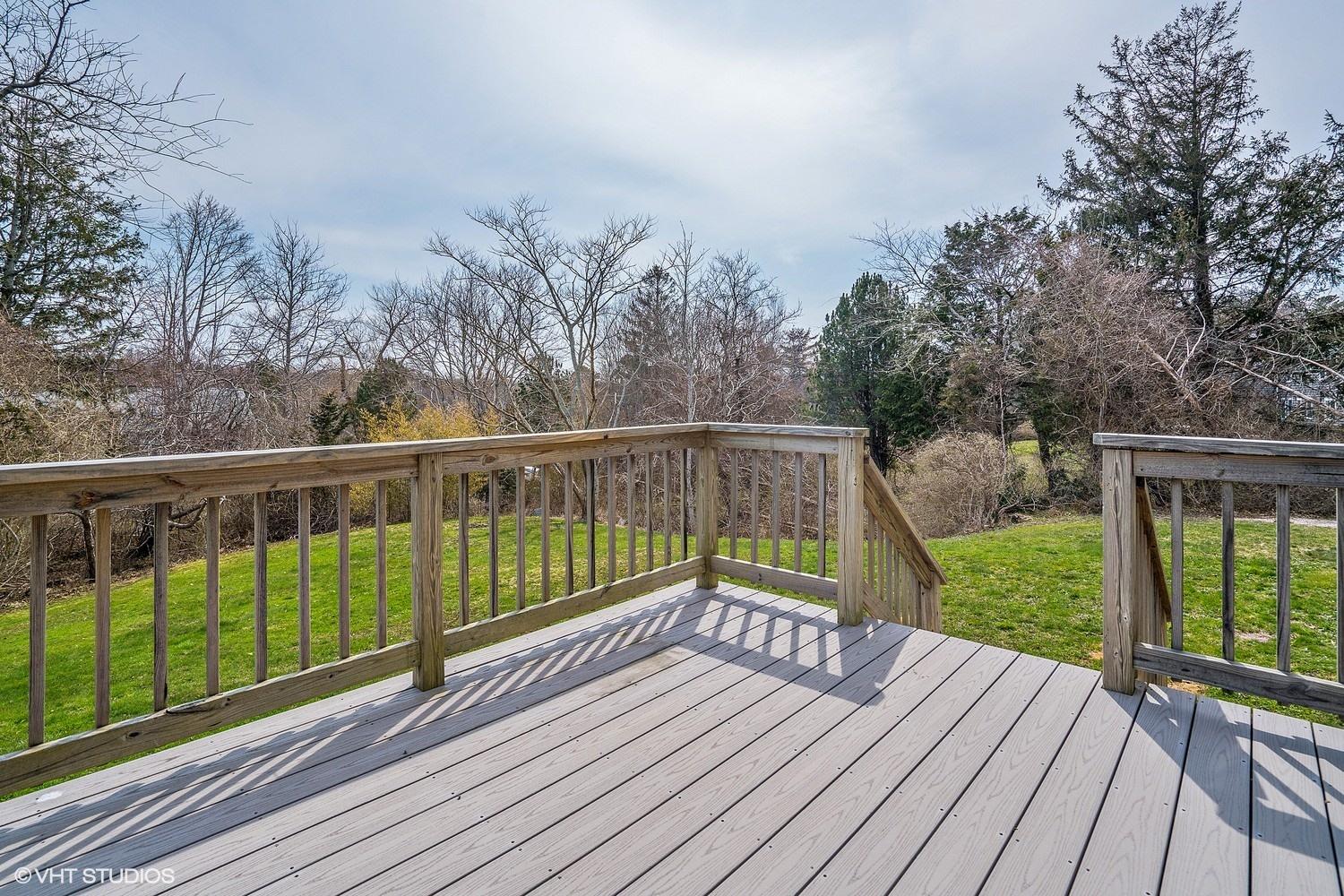 151 Harbor Point Road Cummaquid, MA 02675 - Photo 13 of 14 a view of balcony with wooden floor and fence