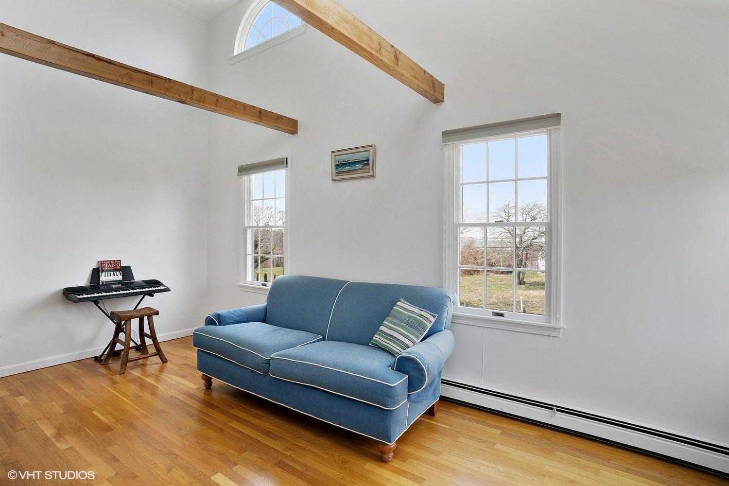 151 Harbor Point Road Cummaquid, MA 02675 - Photo 8 of 14 a living room with furniture and a window