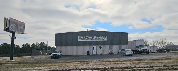 a view of a street with cars