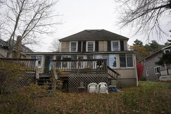 a front view of a house with yard