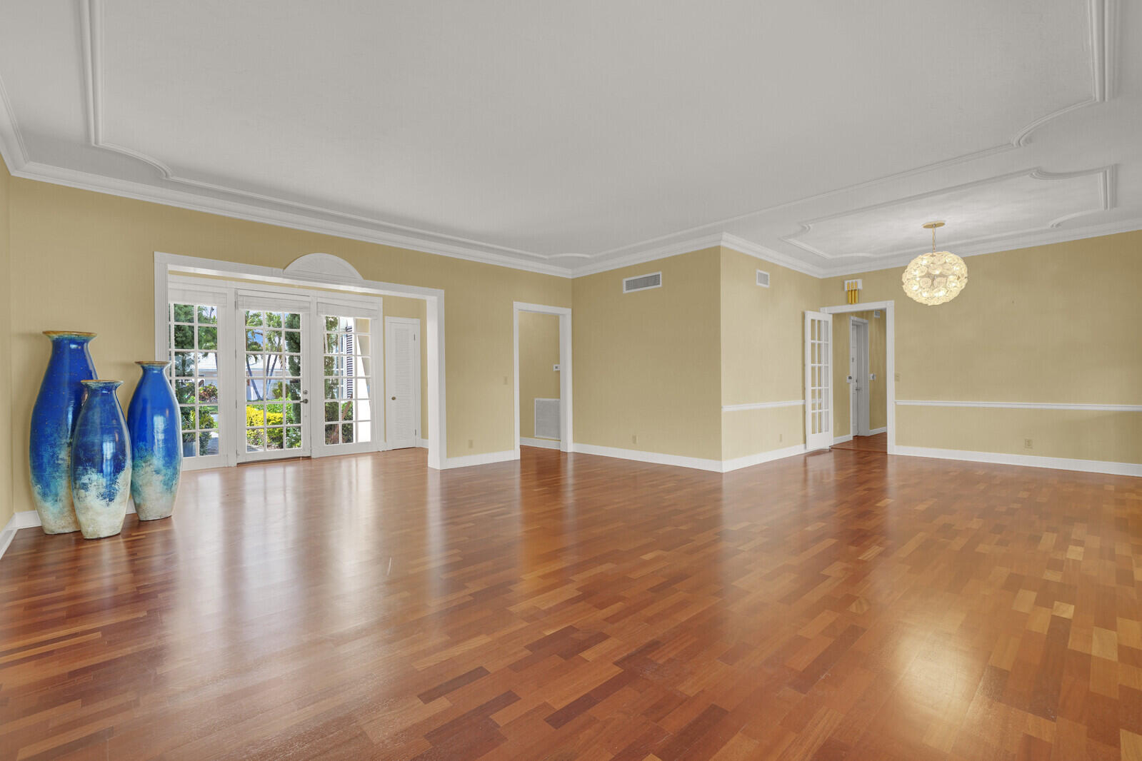 1210 Bimini Lane Singer Island, FL 33404 - Photo 20 of 64 a view of an empty room with wooden floor and a window