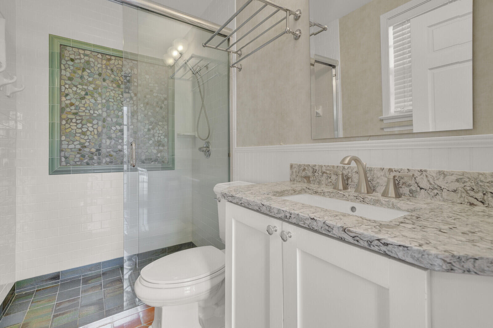 1210 Bimini Lane Singer Island, FL 33404 - Photo 30 of 64 a bathroom with a granite countertop sink toilet and shower