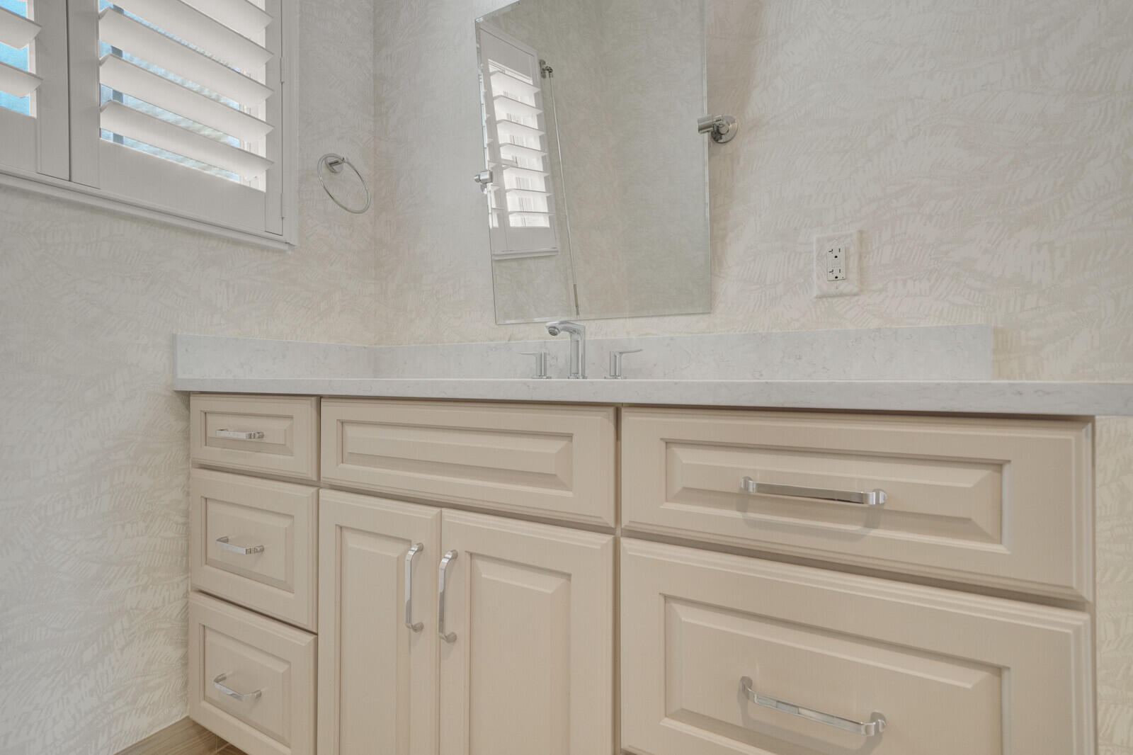 1210 Bimini Lane Singer Island, FL 33404 - Photo 39 of 64 a bathroom with a sink and a mirror