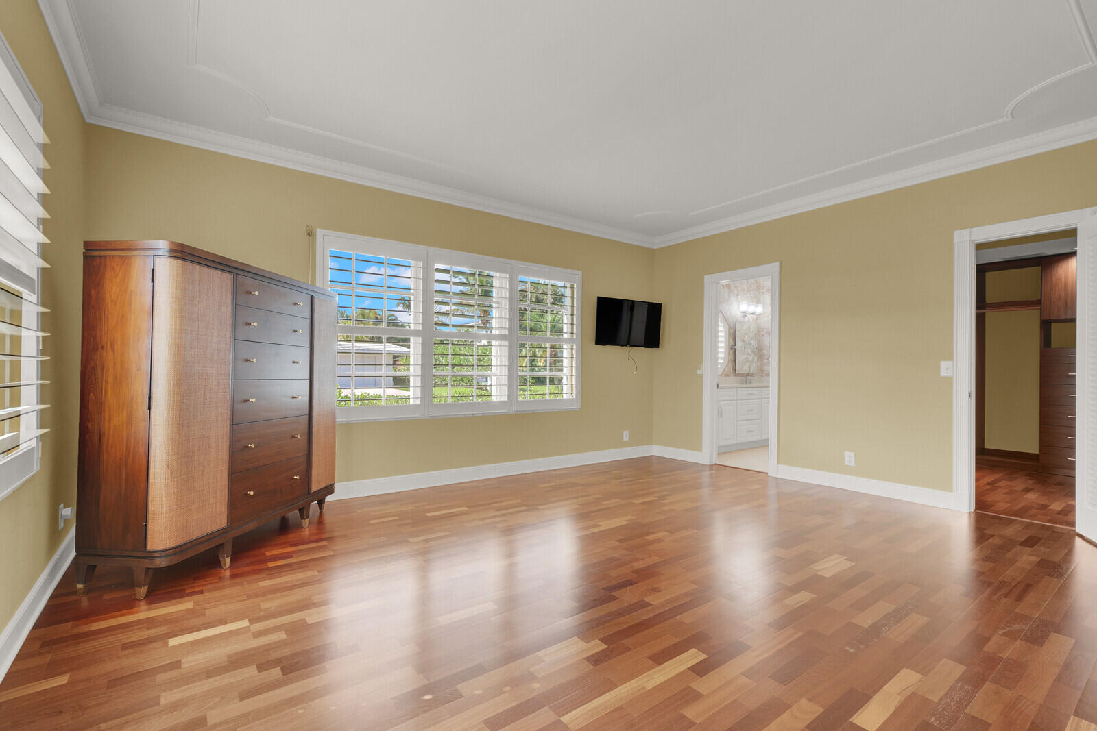 1210 Bimini Lane Singer Island, FL 33404 - Photo 43 of 64 an empty room with wooden floor and windows