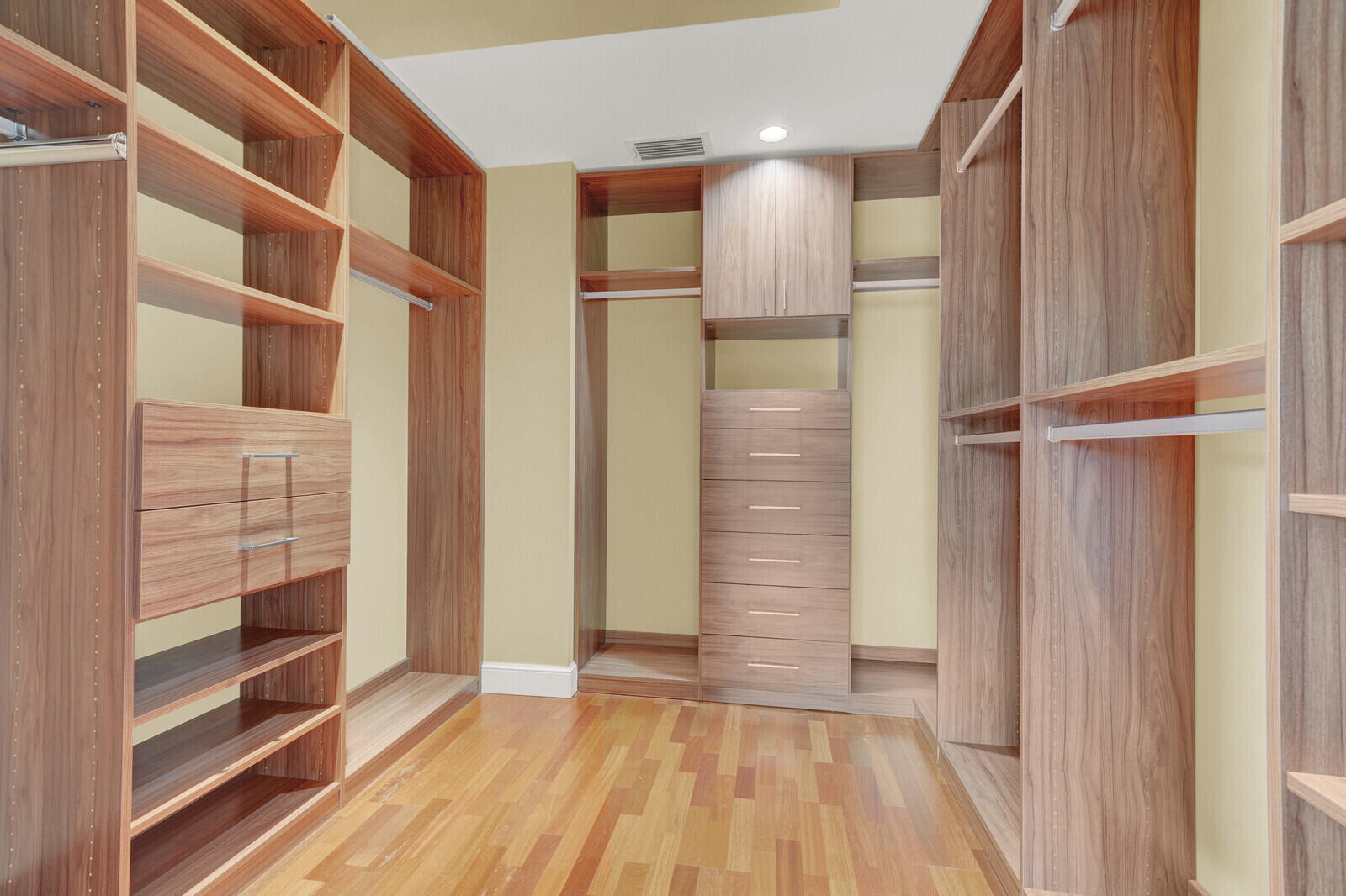 1210 Bimini Lane Singer Island, FL 33404 - Photo 47 of 64 a view of walk in closet with empty racks
