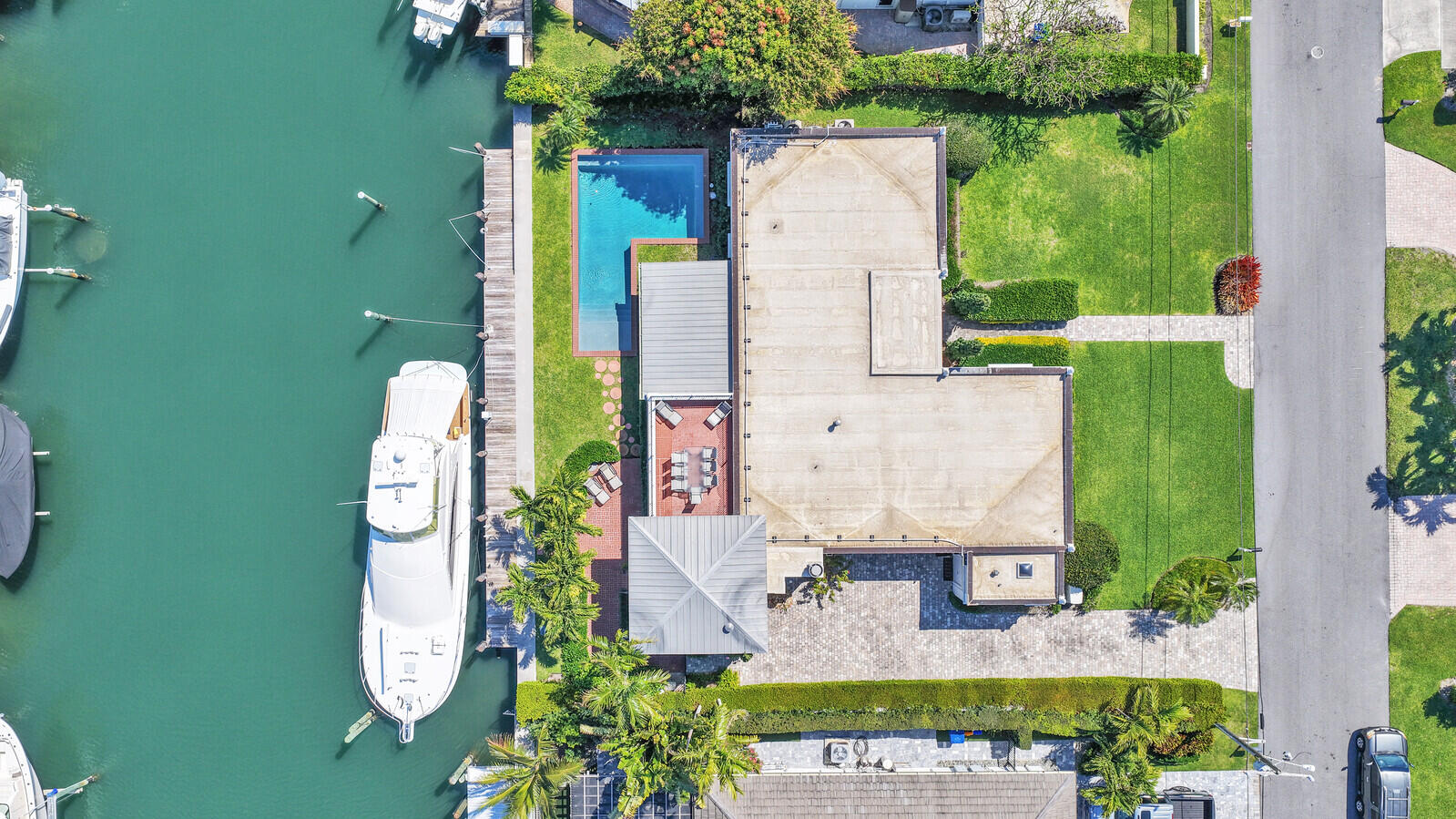 1210 Bimini Lane Singer Island, FL 33404 - Photo 8 of 64 an aerial view of residential house with outdoor space and swimming pool