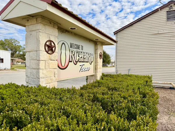 a sign that is on the side of a building