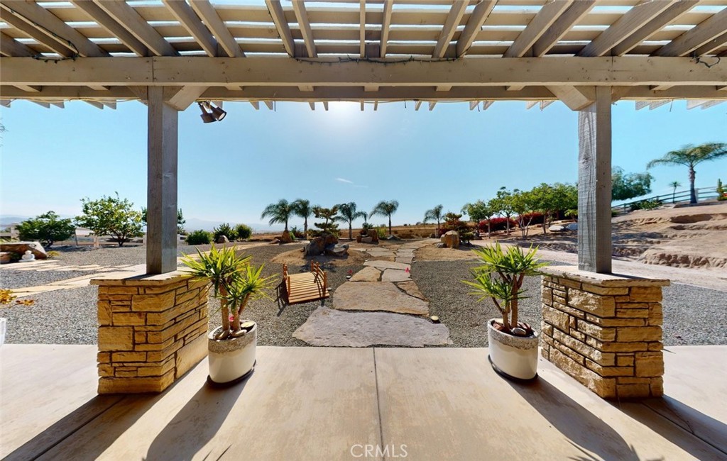 17465 Fairbreeze Court Riverside, CA 92504 - Photo 13 of 30 a terrace with outdoor seating and city view