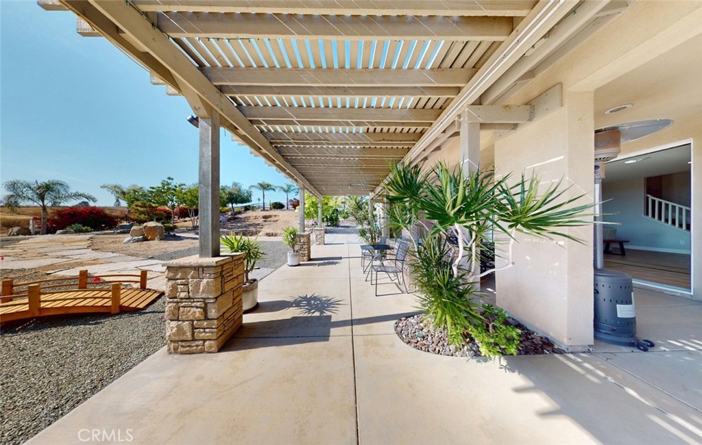 17465 Fairbreeze Court Riverside, CA 92504 - Photo 14 of 30 a view of a porch with seating space