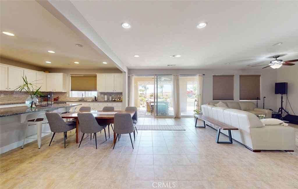 17465 Fairbreeze Court Riverside, CA 92504 - Photo 18 of 30 a living room with lots of furniture and a large window