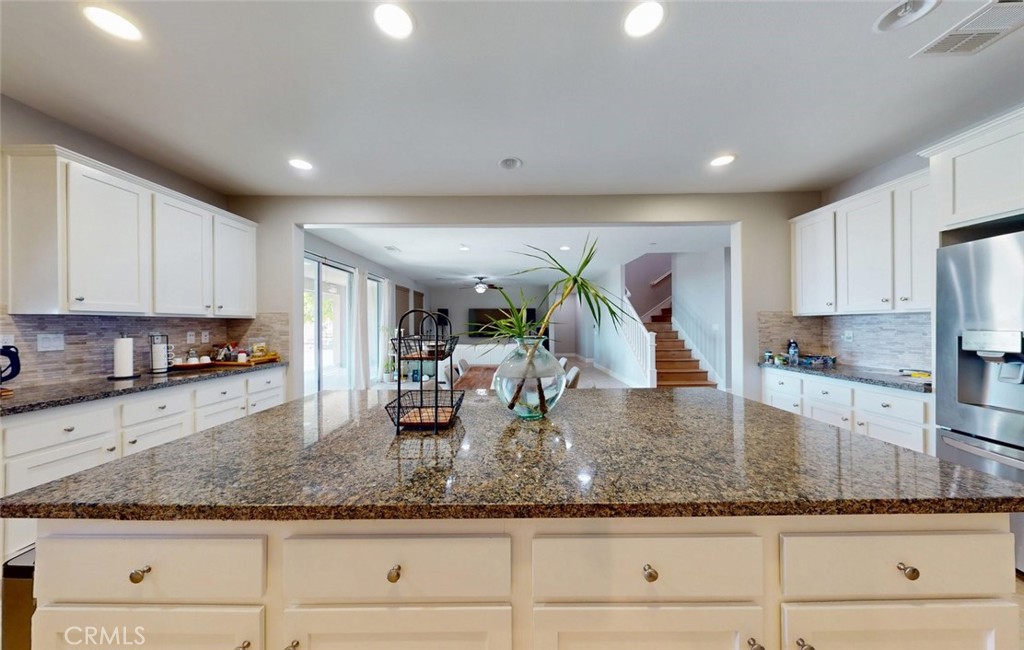 17465 Fairbreeze Court Riverside, CA 92504 - Photo 20 of 30 a kitchen with sink and cabinets