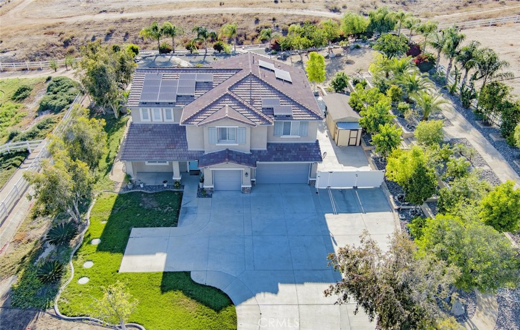 17465 Fairbreeze Court Riverside, CA 92504 - Photo 3 of 30 an aerial view of a house with a yard