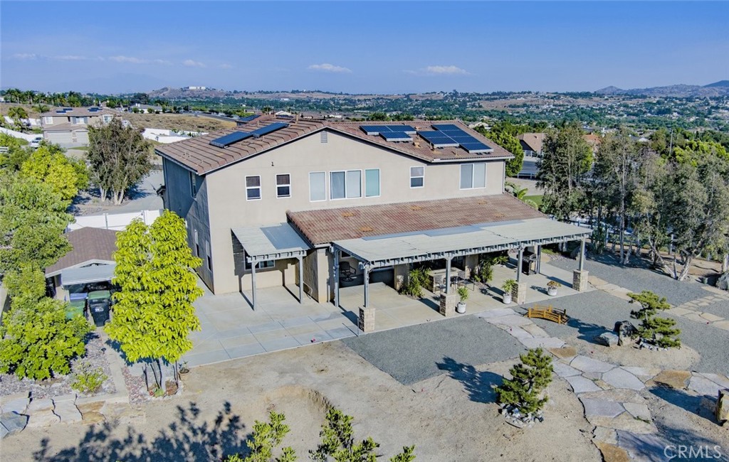 17465 Fairbreeze Court Riverside, CA 92504 - Photo 5 of 30 an aerial view of a house with a garden